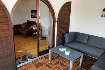 Ein Sitzbereich in der Unterkunft Isarkindl
