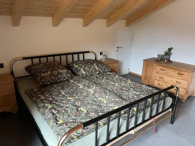 Ein Bett oder Betten in einem Zimmer der Unterkunft Mountain Hideout Wolfsee