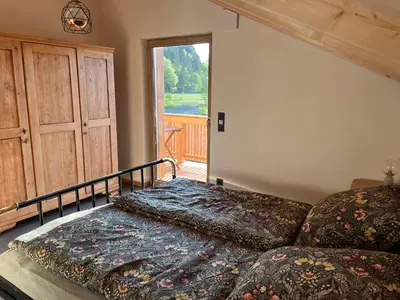 Ein Bett oder Betten in einem Zimmer der Unterkunft Mountain Hideout Wolfsee