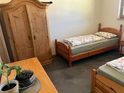 Ein Bett oder Betten in einem Zimmer der Unterkunft Mountain Hideout Wolfsee