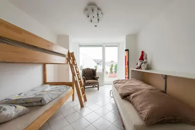 Ein Bett oder Betten in einem Zimmer der Unterkunft Munich Rooftop Retreat