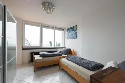 Ein Bett oder Betten in einem Zimmer der Unterkunft Munich Rooftop Retreat