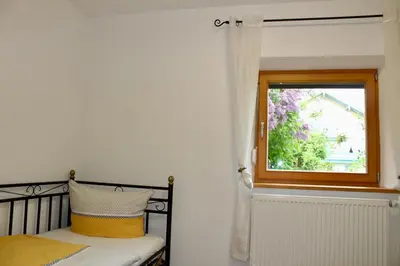 Ein Bett oder Betten in einem Zimmer der Unterkunft Ferienhaus mit Garten für bis zu 6 Personen