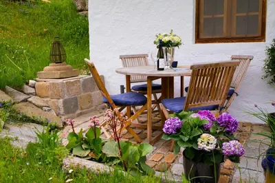 Ein Garten an der Unterkunft Steinbachhof Chiemsee