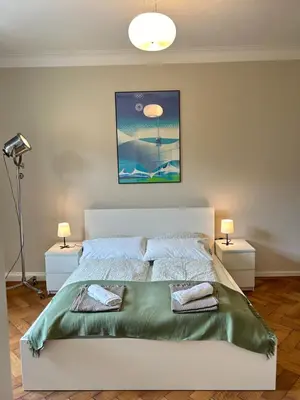 Ein Bett oder Betten in einem Zimmer der Unterkunft Welcome Künstlerflair