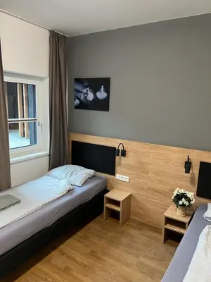 Ein Bett oder Betten in einem Zimmer der Unterkunft Firstsleep Ebersberg
