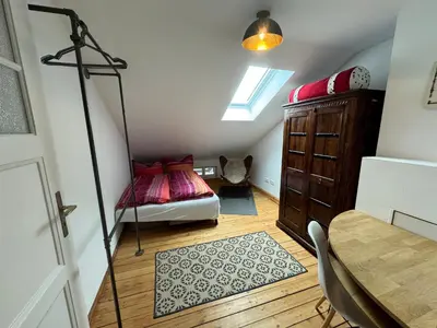 Ein Bett oder Betten in einem Zimmer der Unterkunft Dachgeschoss Wohnung mit Traum Bergblick