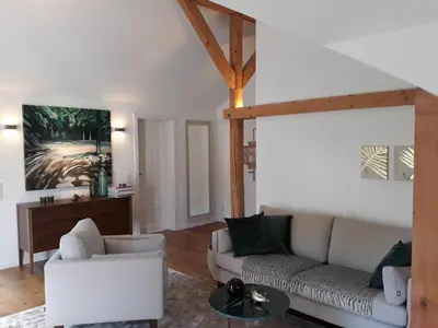 Ein Sitzbereich in der Unterkunft Apartment Schreyegg