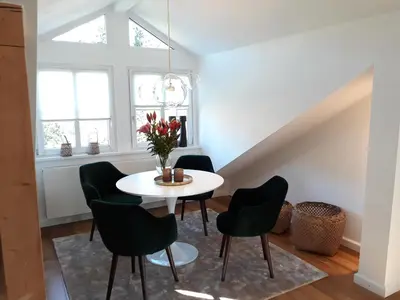 Ein Sitzbereich in der Unterkunft Apartment Schreyegg