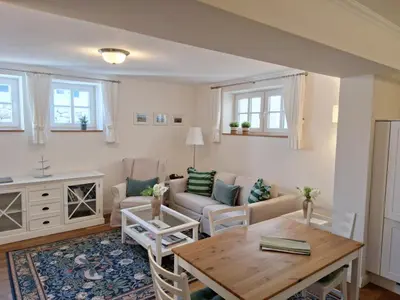 Ein Sitzbereich in der Unterkunft Apartment Schreyegg