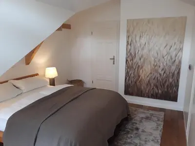 Ein Bett oder Betten in einem Zimmer der Unterkunft Apartment Schreyegg