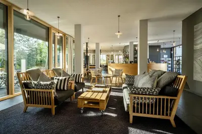 Ein Sitzbereich in der Unterkunft Bader Hotel