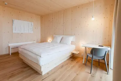 Ein Bett oder Betten in einem Zimmer der Unterkunft Bader Hotel