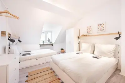 Ein Bett oder Betten in einem Zimmer der Unterkunft Top floor apartment next to Marienplatz