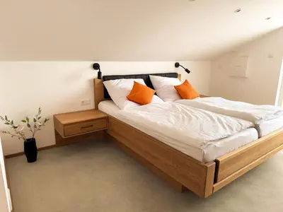 Ein Bett oder Betten in einem Zimmer der Unterkunft Ferienwohnung Eggstätt