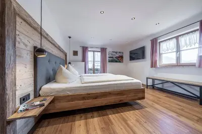 Ein Bett oder Betten in einem Zimmer der Unterkunft Ferienwohnungen Haus Heiss
