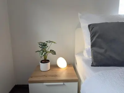 Ein Bett oder Betten in einem Zimmer der Unterkunft Ferienwohnung 