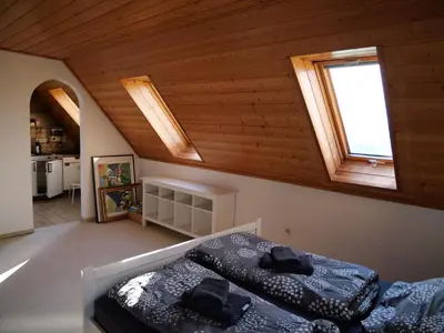 Ein Bett oder Betten in einem Zimmer der Unterkunft Ferienwohnung in Weichs