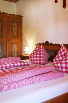 Ein Bett oder Betten in einem Zimmer der Unterkunft Widernhof