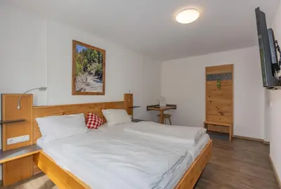 Ein Bett oder Betten in einem Zimmer der Unterkunft isarwinkel
