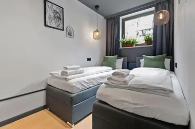 Ein Bett oder Betten in einem Zimmer der Unterkunft Flatista Homes - Jungle House