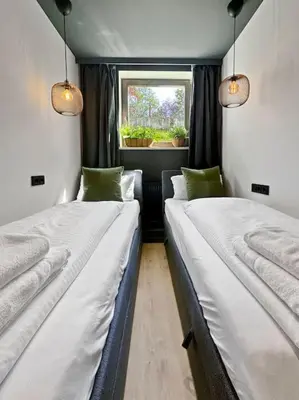 Ein Bett oder Betten in einem Zimmer der Unterkunft Flatista Homes - Jungle House