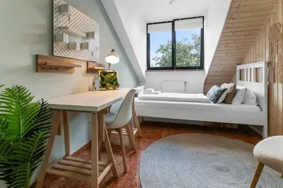 Ein Bett oder Betten in einem Zimmer der Unterkunft Flatista Homes - Penthouse with Rooftop Gym