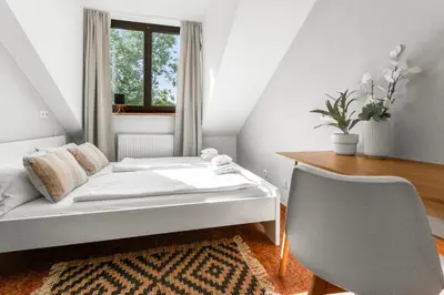 Ein Bett oder Betten in einem Zimmer der Unterkunft Flatista Homes - Penthouse with Rooftop Gym