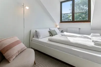 Ein Bett oder Betten in einem Zimmer der Unterkunft Flatista Homes - Penthouse with Rooftop Gym