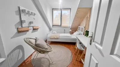 Ein Bett oder Betten in einem Zimmer der Unterkunft Flatista Homes - Penthouse with Rooftop Gym