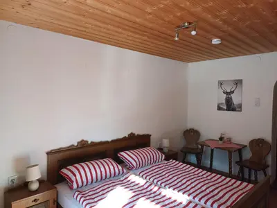 Ein Bett oder Betten in einem Zimmer der Unterkunft Ferienwohnungen „Zum Bauern“