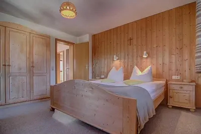 Ein Bett oder Betten in einem Zimmer der Unterkunft Ferienwohnungen Mayr