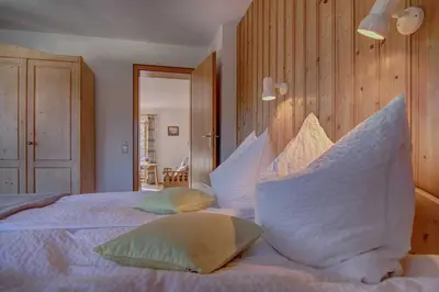 Ein Bett oder Betten in einem Zimmer der Unterkunft Ferienwohnungen Mayr