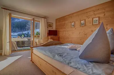 Ein Bett oder Betten in einem Zimmer der Unterkunft Ferienwohnungen Mayr