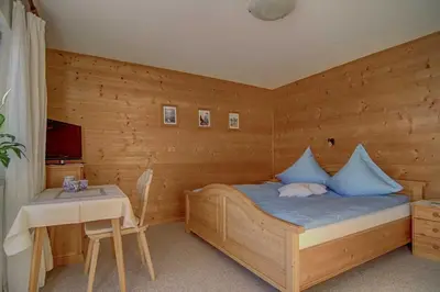 Ein Bett oder Betten in einem Zimmer der Unterkunft Ferienwohnungen Mayr