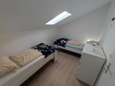 Ein Bett oder Betten in einem Zimmer der Unterkunft Wohnung Zulic