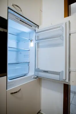 Küche/Küchenzeile in der Unterkunft C4S -COME4STAY -InnHarmony- Stilvoll eingerichtetes Apartment für bis zu 8 Personen - Hochwertige Betten I voll ausgestattete Küche I Balkon I Badezimmer I WLAN I Smart TV