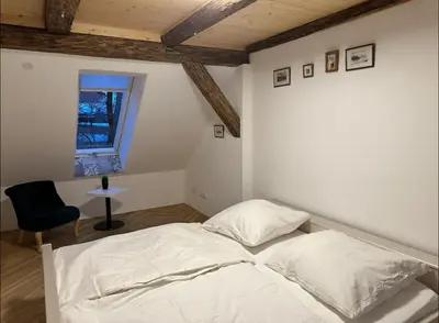Ein Bett oder Betten in einem Zimmer der Unterkunft Exklusive Maisonetten Wohnung mit Gartenzugang