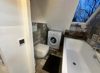 Ein Badezimmer in der Unterkunft Exklusive Maisonetten Wohnung mit Gartenzugang