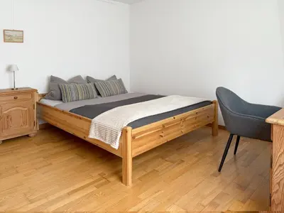 Ein Bett oder Betten in einem Zimmer der Unterkunft Ferienwohnung Gartenblick