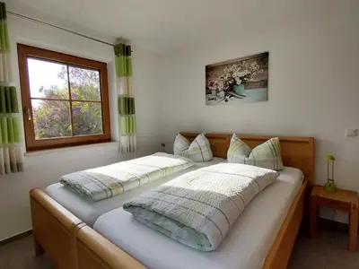 Ein Bett oder Betten in einem Zimmer der Unterkunft Kern's Hoamat