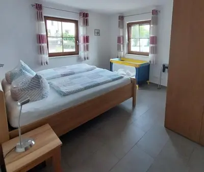 Ein Bett oder Betten in einem Zimmer der Unterkunft Kern's Hoamat