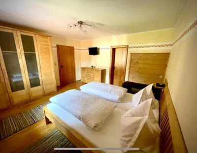 Ein Bett oder Betten in einem Zimmer der Unterkunft Ferienhaus Daxenberger