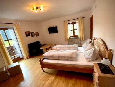 Ein Bett oder Betten in einem Zimmer der Unterkunft Ferienhaus Daxenberger