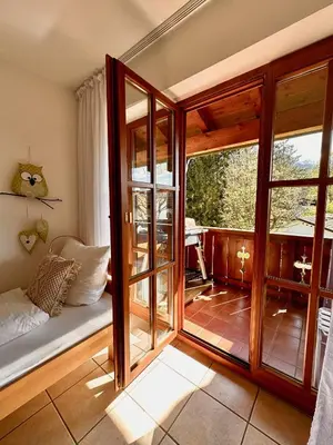 Ein Bett oder Betten in einem Zimmer der Unterkunft Sweet Home Bergblick