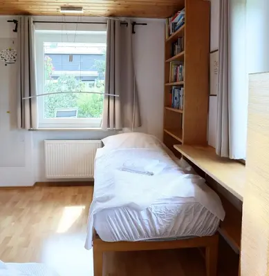 Ein Bett oder Betten in einem Zimmer der Unterkunft 90m² Top Holiday Home Upper Bavaria + Munich South