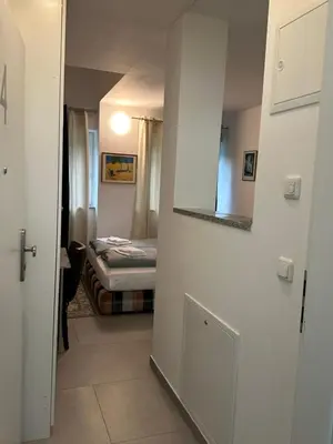 Ein Bett oder Betten in einem Zimmer der Unterkunft Estelada City Studios - Bogenhausen