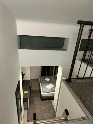 Ein Bett oder Betten in einem Zimmer der Unterkunft Estelada City Studios - Bogenhausen