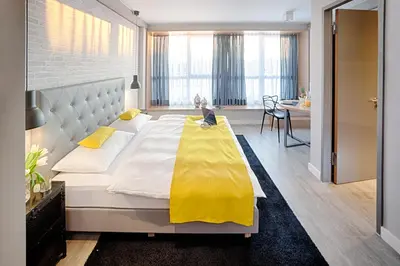Ein Bett oder Betten in einem Zimmer der Unterkunft MLOFT Apartments München