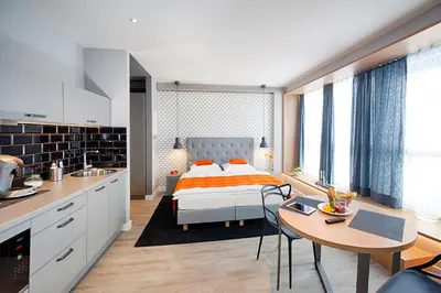 Ein Bett oder Betten in einem Zimmer der Unterkunft MLOFT Apartments München